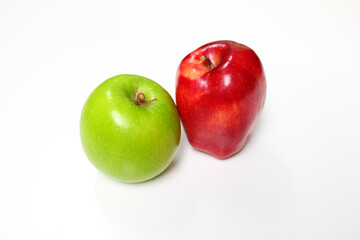 Organic green and red apples on white background