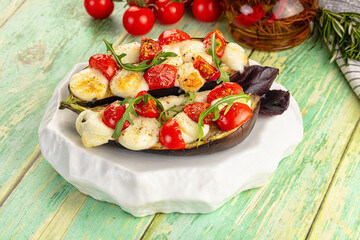 Baked eggplant with cherry and mozzarella
