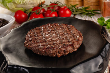Grilled juicy beef cutlet for burger