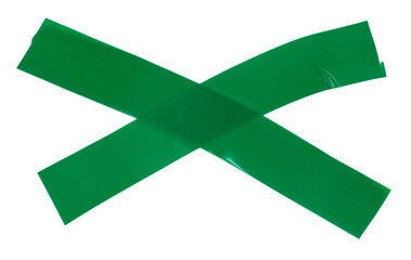 Isolated green cross made of electrical tape on white background