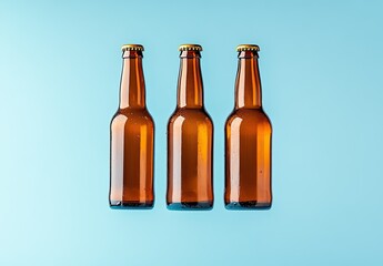 Three amber glass bottles arranged vertically against a light blue background