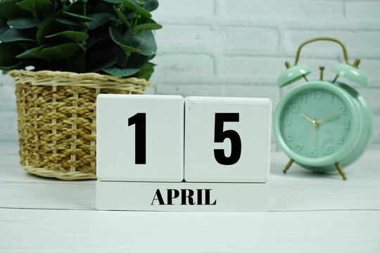 Wooden Calendar Showing the Date of April 15th. Day 15 of April month