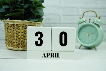Wooden Calendar Showing the Date of April 30th. Day 30 of April month