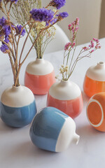 Dry Flower in colorful ceramic vase, Minimal interior decoration concept.
