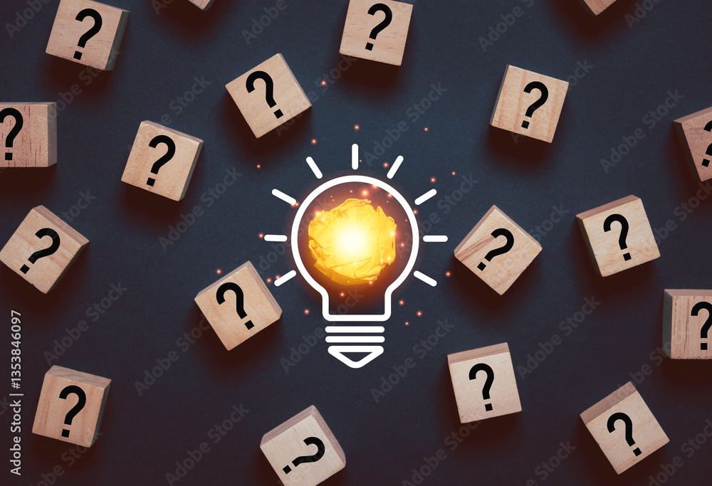 Aufkleber glowing light bulb from yellow scrap paper among question mark for focus and concentrate of creative