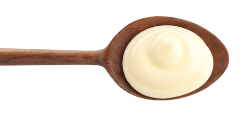 Tasty mayonnaise sauce in wooden spoon isolated on white, top view