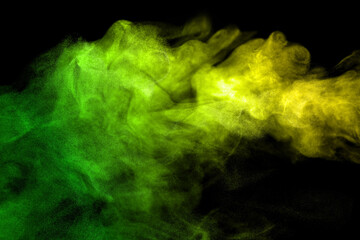 yellow green smoke, abstract element smog isolated on a black background.  concept of texture mist,...