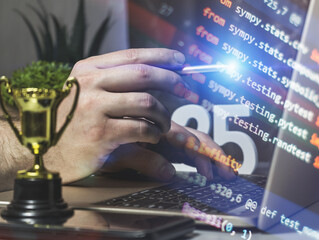 programmer at work: futuristic coding scene with trophy and thoughts on laptop