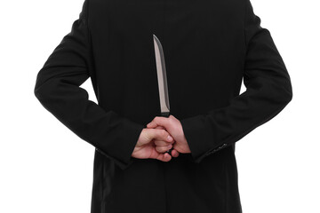 Businessman holding knife behind his back on white background, closeup