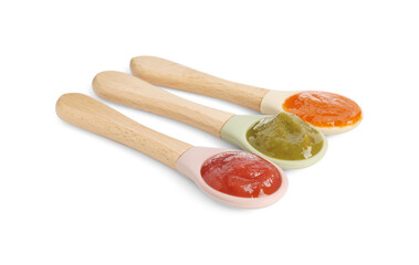 Baby food. Spoons with tasty puree on white background