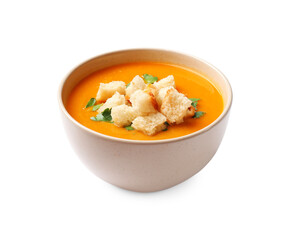Tasty pumpkin cream soup with croutons and parsley in bowl isolated on white