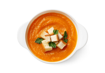 Tasty pumpkin cream soup with croutons and parsley in bowl isolated on white, top view