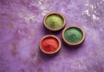 Vibrant Powders in Wooden Bowls on Textured Purple Background for Artistic and Culinary Use