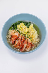 Egg Noodles with Roast Red Pork, Egg Noodle Soup with Red Roasted Pork Soup, steaming bowl of egg noodles in a rich broth, topped with tender roasted red pork, Thaifood