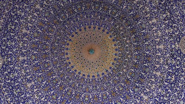Dome of the Imam Mosque. Stunning interior of Imam Mosque, Isfahan, Iran showcasing intricate tilework, soaring arches, and vibrant geometric patterns. This architectural gem. Perfect Islamic art.