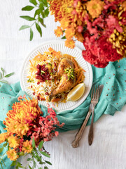 Top Down Flat Lay Photo of a Persian Chicken Dish with Rice and Barberries in Natural Light