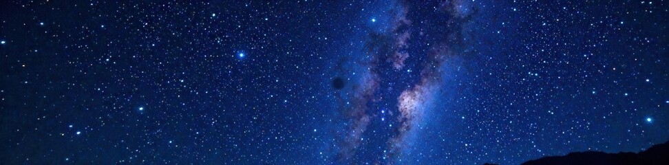 Fototapeta premium Cosmic night sky with twinkling stars on a dark background, astronomy, sparkle