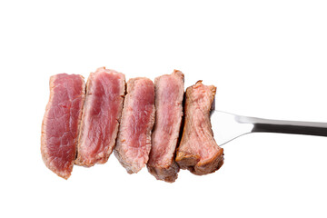 Delicious sliced beef tenderloin with different degrees of doneness isolated on white