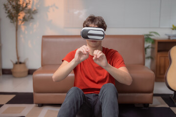 Young man sitting on the floor of a cozy living room, engaging with a virtual reality headset while playing an exciting videogame, gesturing animatedly with his hands