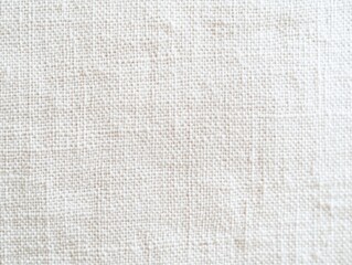 Fototapeta premium Close-up of textured white fabric with natural fibers and weave