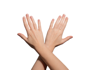 Well-groomed female hands with glossy, polished nails crossing at the wrist. Neat, soft skin with a minimalist, aesthetic look. Beauty, hygiene, and elegance. Isolated on white background..