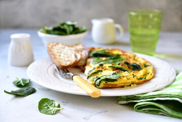 Omelet stuffed with spinach and cheese