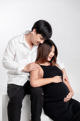 Expecting Love Happy Asian Couple Embracing Pregnancy