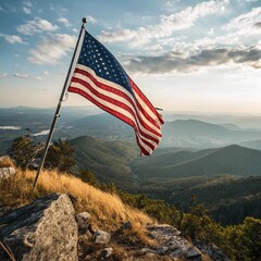 An American flag waving proudly on a mountain peak