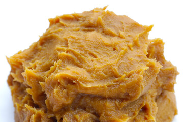 Japanese miso paste on white background.