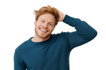 Smiling young white man in blue sweater touching hair on white background