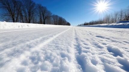 Obraz premium Snowy winter road, sunny day