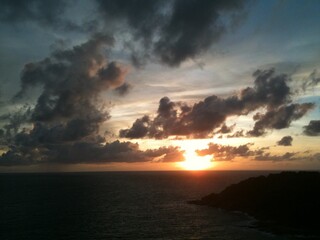 Phuket Sea golden sunset with cloudy sky