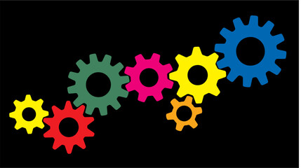 Gears of different colors on a black background