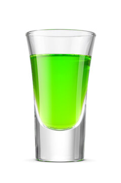 Green absinthe alcoholic drink in shot glass isolated. Transparent PNG image.