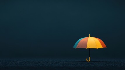 Brightly Colored Umbrella Standing Alone on Dark Background with Unique Shape and Design Ideal for Weather Protection, Rainy Day, and Shelter Concepts