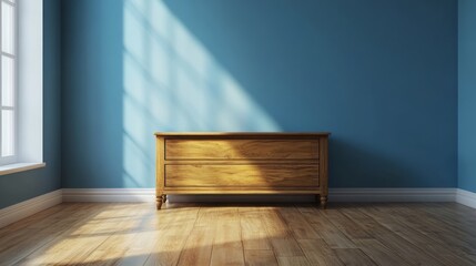A wooden dresser sits in a room with blue walls