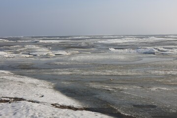 the bay is partially frozen in winter