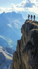 Hikers arrive at a mountain summit with sweeping panoramic views of the valley. Vertical.