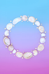 Mother of pearl seashell and pearls wreath on gradient blue purple background, Natural marine life...