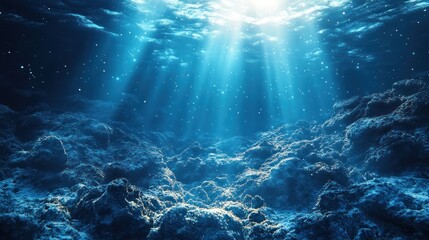 Obraz premium Underwater scene, sunlight beams through water, rocky seabed, calm ocean depths