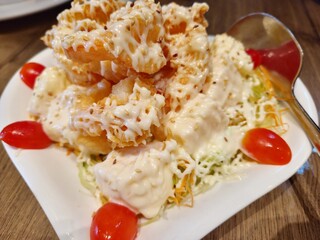 Fried Shrimp Salad on White Plate 