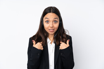 Young telemarketer woman isolated on white background with surprise facial expression