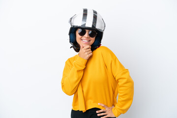 Woman with a motorcycle helmet with glasses and smiling