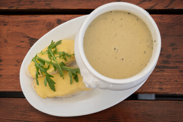 Garlic soup with grilled cheese sandwich in Polish mountains cafe, Gubałówka, Zakopane, Poland.