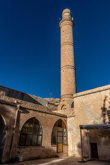 Fototapeta premium Minaret of the Latifiye Mosque in Mardin, Turkey