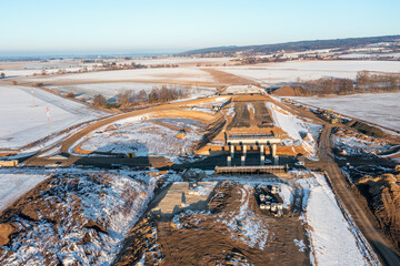 Future highway exit Hořice on D35, under construction in winter, will improve access and traffic flow.