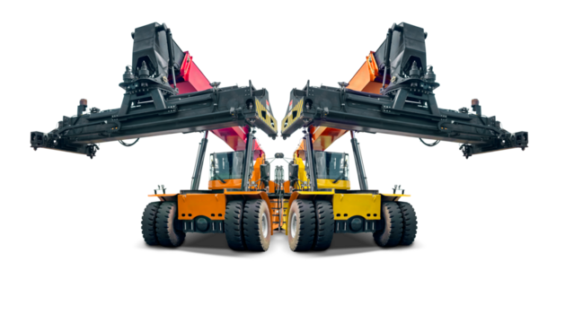 Two heavy-duty reach stacker loaders for loading sea containers. Isolated for design.