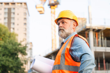 Portrait of Construction manager overseeing site operations