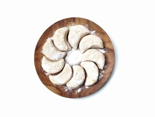 Kue putri salju or Snow princess cookies on plate isolated on white background 