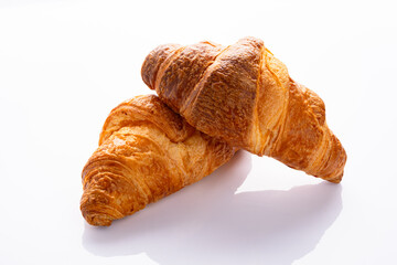 Delicious snack croissant on white background